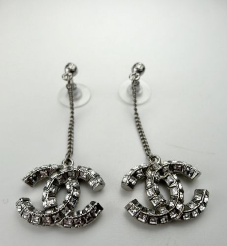 CHANEL EARRINGS IN SILVER TON METAL WITH STRASS