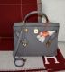 HERMÉS KELLY BAG 40 ETAIN RETOURNÉ TOGO GOLD HARDWARE