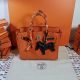HERMÈS BIRKIN BAG 30 ORANGE OSTRICH PALLADIUM HARDWARE