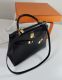 HERMÉS KELLY BAG 32 BLACK BOX LEDER GOLD HARDWARE 