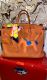 HERMÉS BIRKIN BAG 40 ORANGE TOGO GOLD HARDWARE