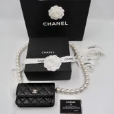 CHANEL CLUTCH BLACK WITH PERLS GOLD TON METAL