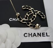 CHANEL BROOCH IN GOLD TONE METAL